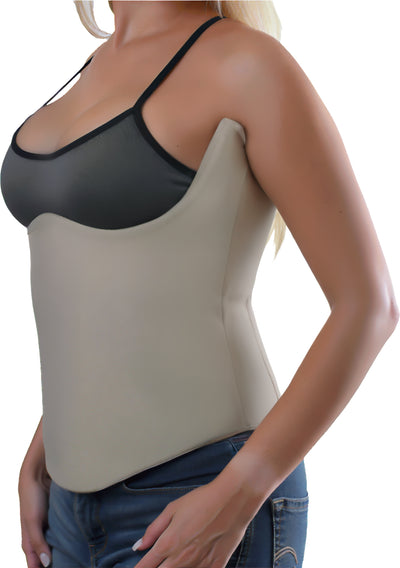 Woman wearing a beige women's liposuction compression vest, angled side view